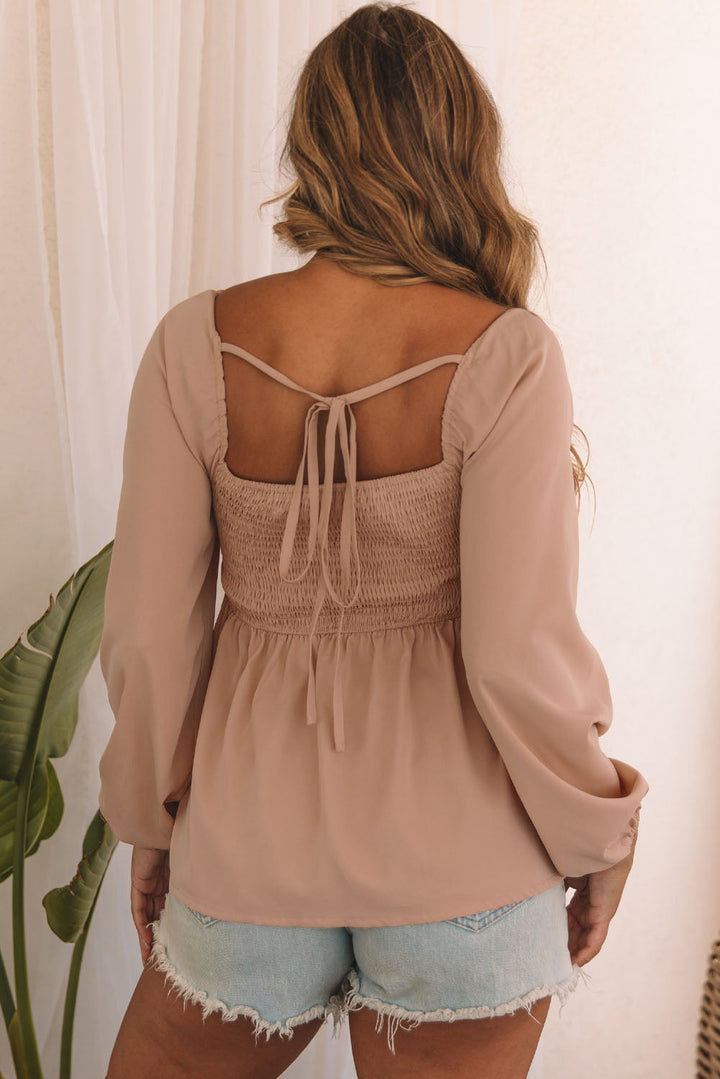 Notched V-Neck Smocked Back Peplum Blouse