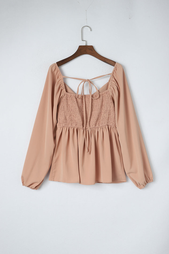 Notched V-Neck Smocked Back Peplum Blouse